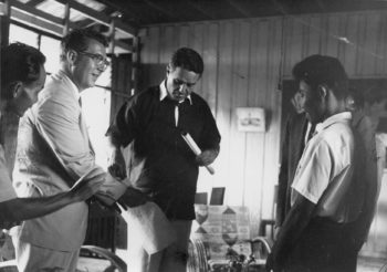 Sargent Shriver, Peace Corps Director, middle, Right Roger's Student, Left, American Ambassador to Thailand.